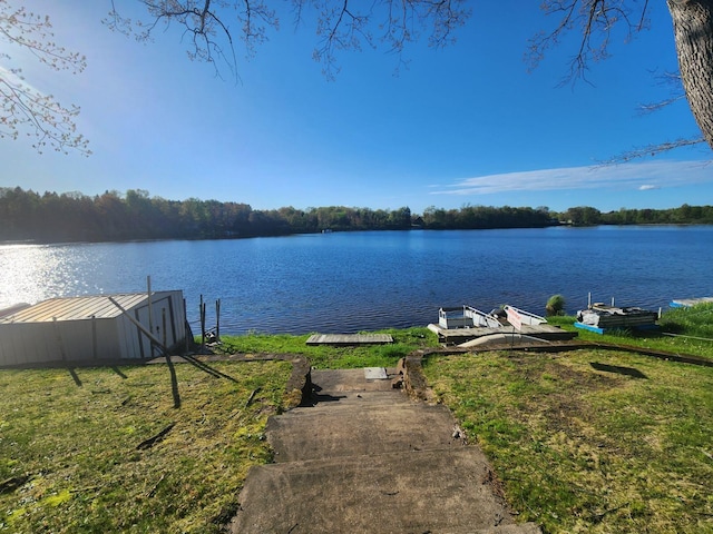 view of water feature with a dock