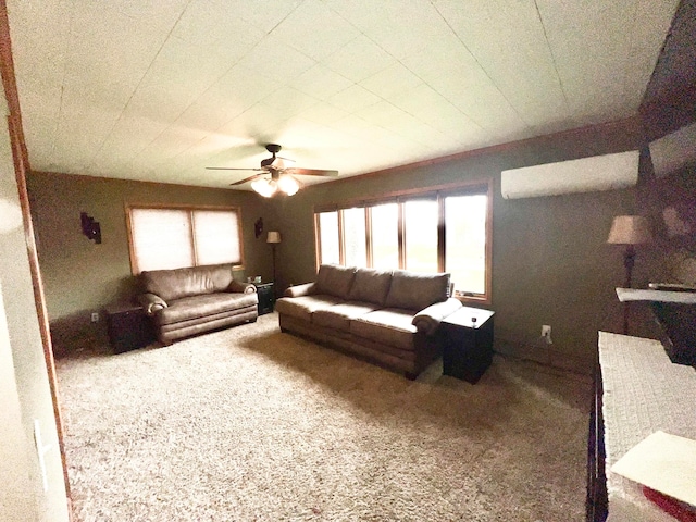 carpeted living room featuring ceiling fan