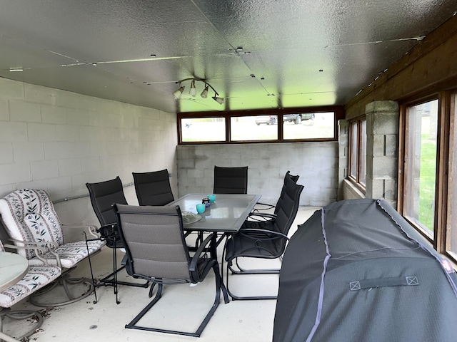 sunroom / solarium featuring a wealth of natural light