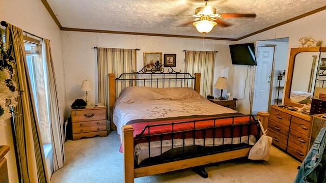 bedroom featuring a textured ceiling, ceiling fan, and carpet