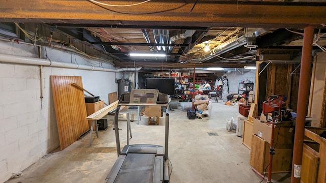 basement featuring water heater