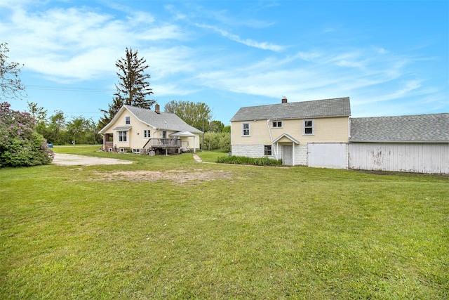 view of yard featuring a wooden deck