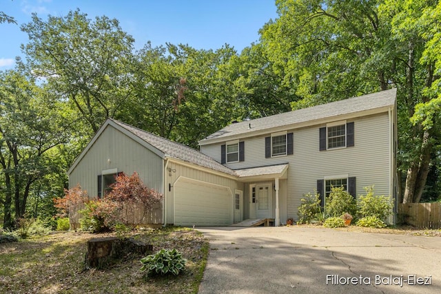 view of front of home with a garage