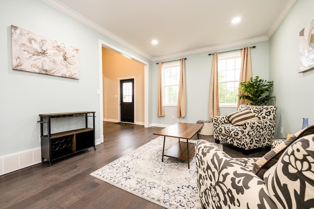 living room featuring ornamental molding and dark hardwood / wood-style flooring