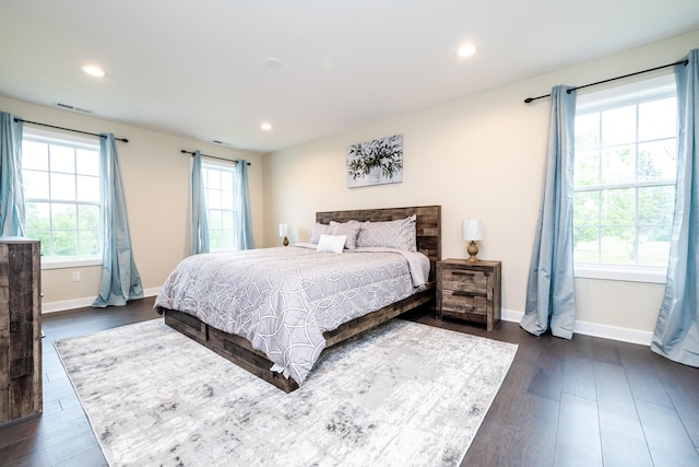 bedroom featuring dark wood-type flooring