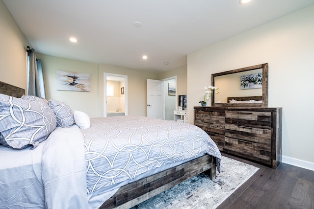 bedroom featuring dark hardwood / wood-style floors and connected bathroom