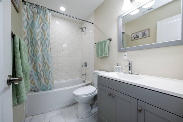 full bathroom featuring vanity with extensive cabinet space, toilet, tile floors, and shower / tub combo