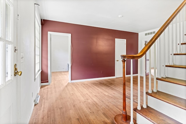 foyer entrance featuring light wood-type flooring