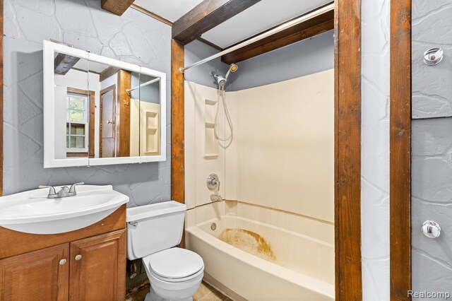 full bathroom with shower / tub combination, oversized vanity, toilet, and tile walls