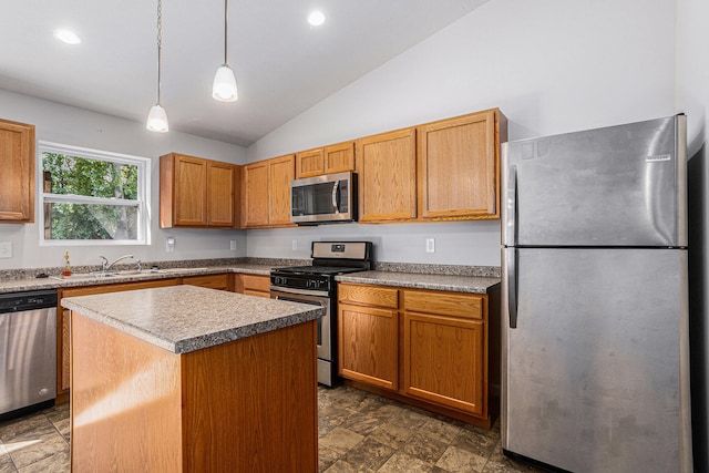 kitchen with a kitchen island, pendant lighting, stainless steel appliances, sink, and lofted ceiling