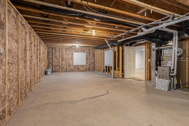 basement with heating unit