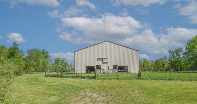 view of outdoor structure with a lawn