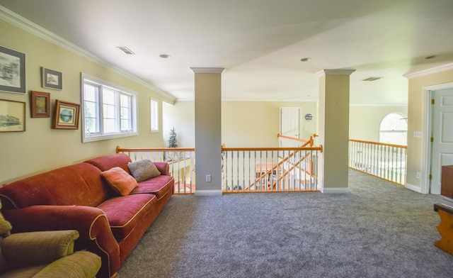 carpeted living room featuring ornamental molding and decorative columns