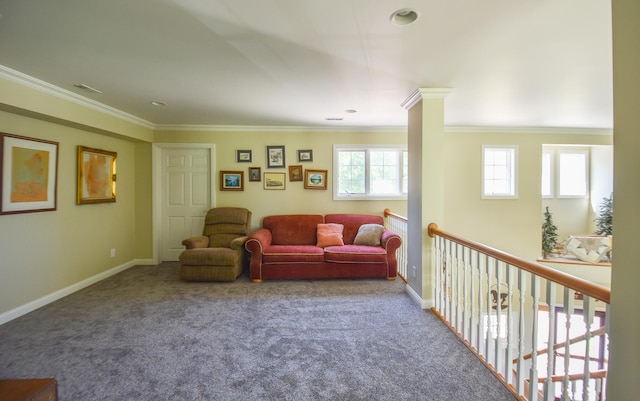 carpeted living room featuring ornamental molding