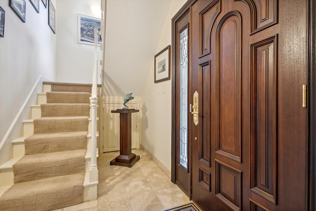 view of tiled foyer entrance