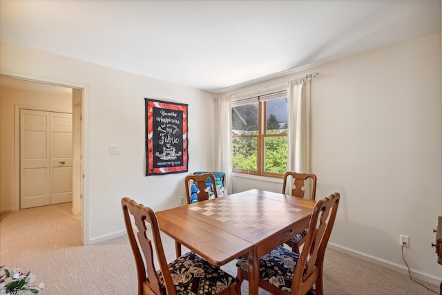 view of carpeted dining room