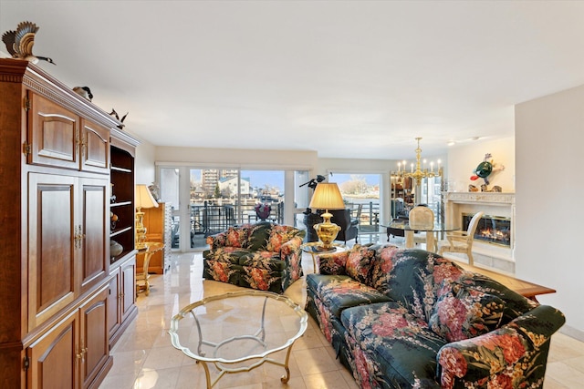 living room with a chandelier and light tile patterned flooring