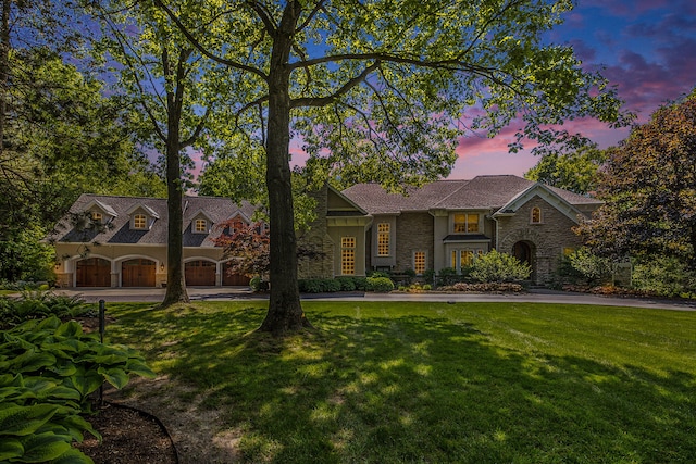 view of front of house with a lawn