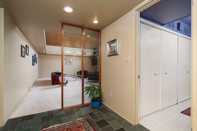 hall featuring tile floors