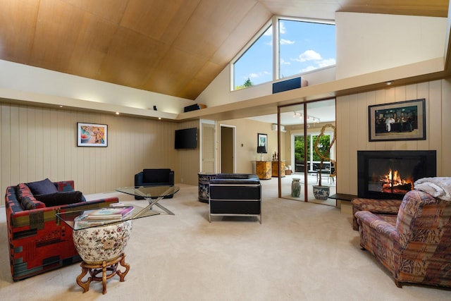 living room featuring high vaulted ceiling and carpet