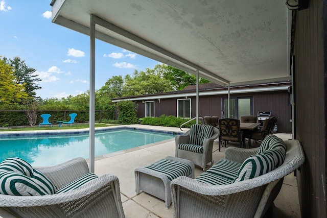 view of pool with a patio area