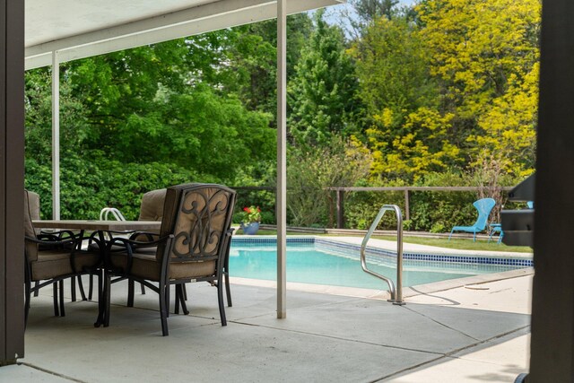 view of swimming pool featuring a patio