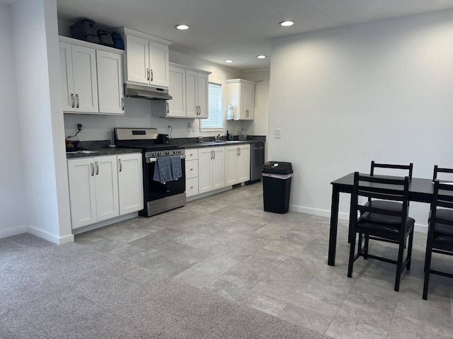 kitchen featuring white cabinetry, light carpet, stainless steel range, sink, and dishwasher