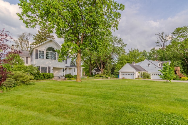 view of yard featuring a garage