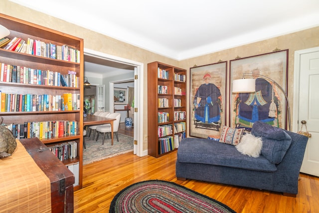 living area featuring hardwood / wood-style floors