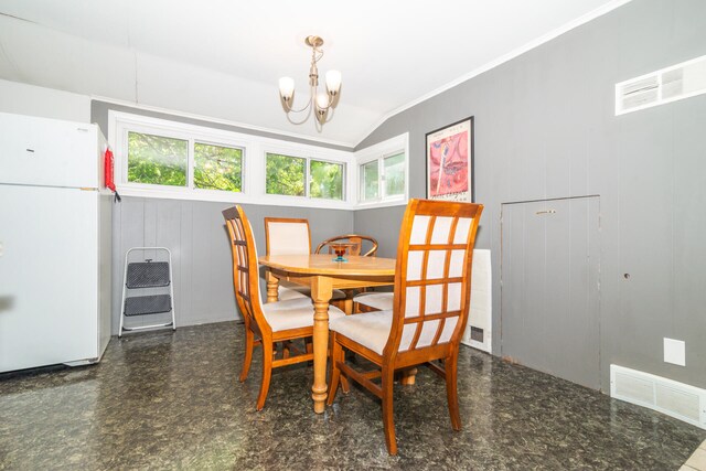 dining area featuring plenty of natural light, tile flooring, lofted ceiling, and a notable chandelier