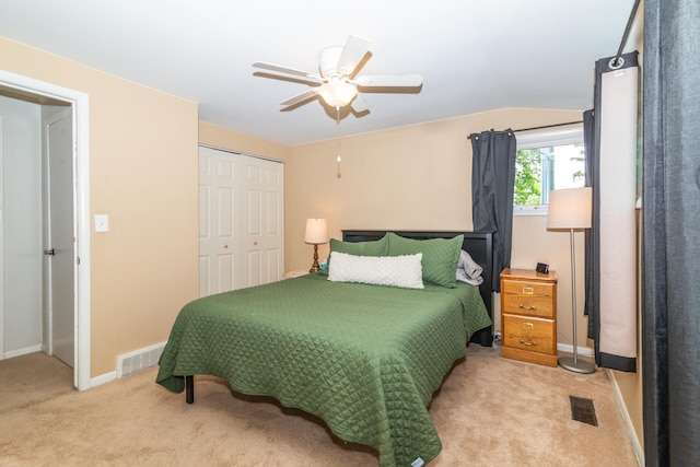 bedroom featuring carpet flooring, a closet, and ceiling fan