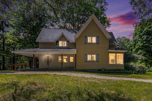 view of front of home with a lawn