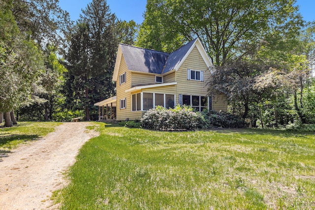 exterior space featuring a front lawn