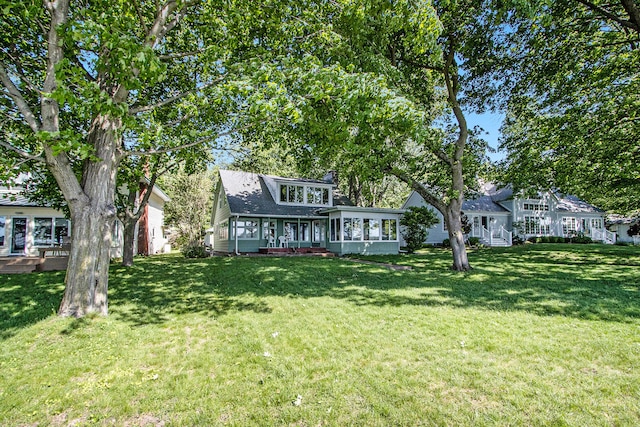 view of front of home with a front lawn