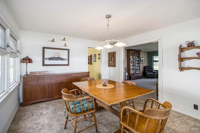 dining area featuring ornamental molding