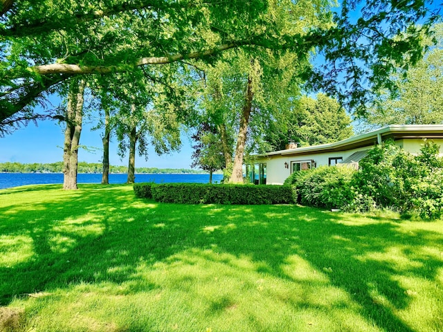 view of yard with a water view