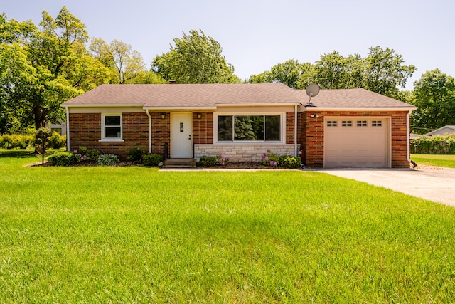 ranch-style home featuring a garage and a front yard