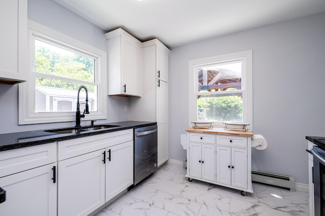 kitchen with a baseboard heating unit, white cabinets, dishwashing machine, sink, and light tile floors