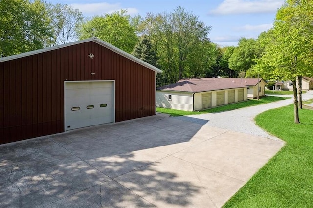 garage with a yard