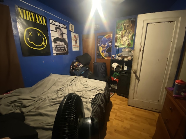 bedroom with light wood-type flooring