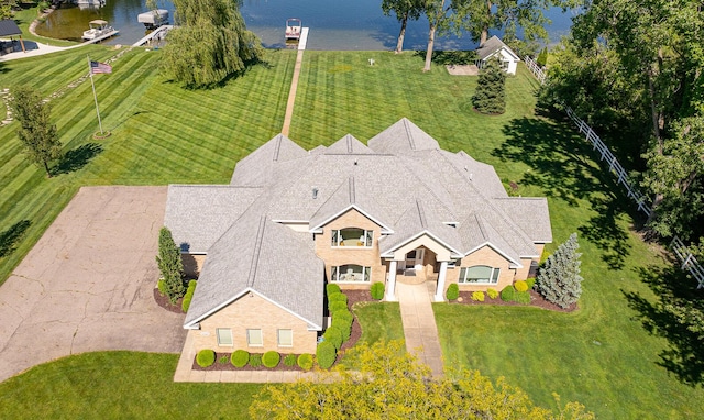 birds eye view of property featuring a water view