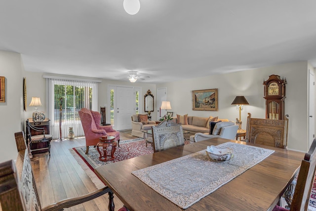 dining area featuring hardwood / wood-style floors and ceiling fan