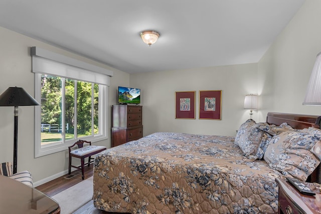 bedroom featuring hardwood / wood-style floors