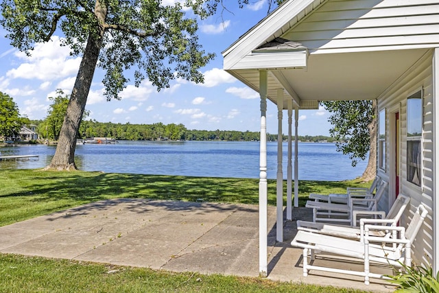 view of patio featuring a water view