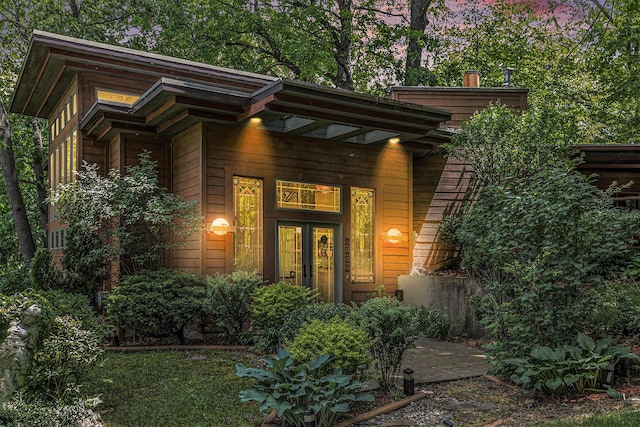 property entrance featuring french doors