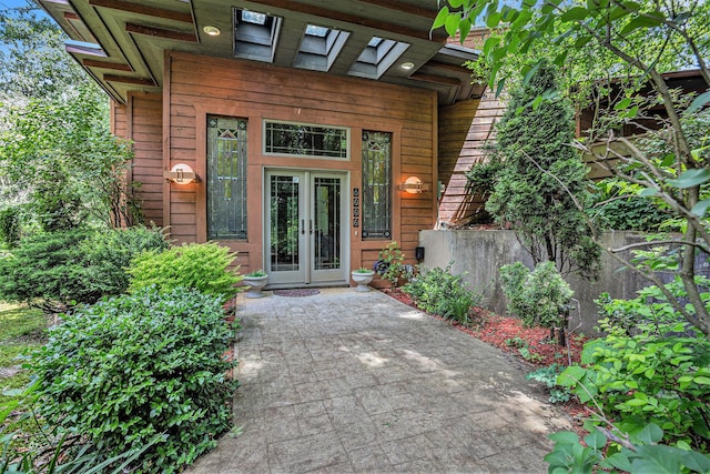 doorway to property featuring french doors