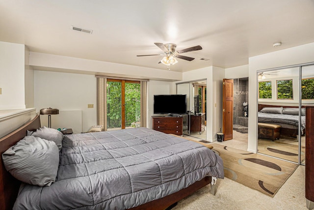 carpeted bedroom featuring ceiling fan