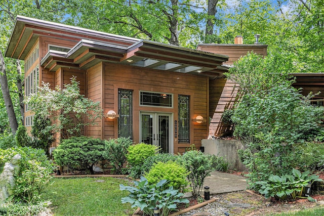 doorway to property featuring french doors