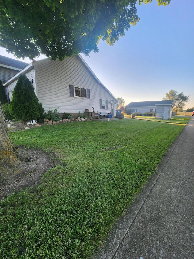 view of home's exterior featuring a yard