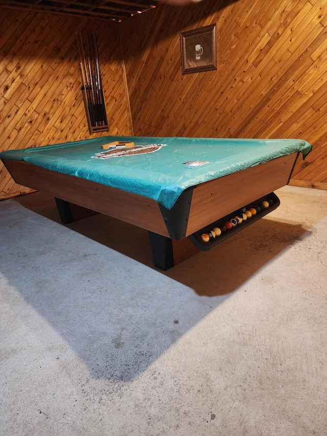 game room featuring carpet, wooden walls, and billiards